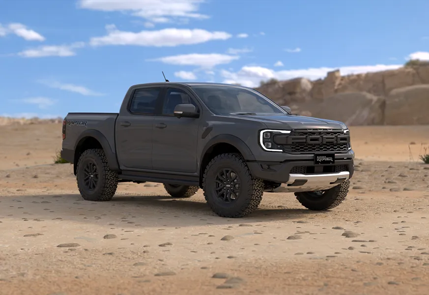 Ford Ranger Raptor in conquer grey among desert boulders