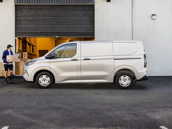 A frozen white Transit Custom Van